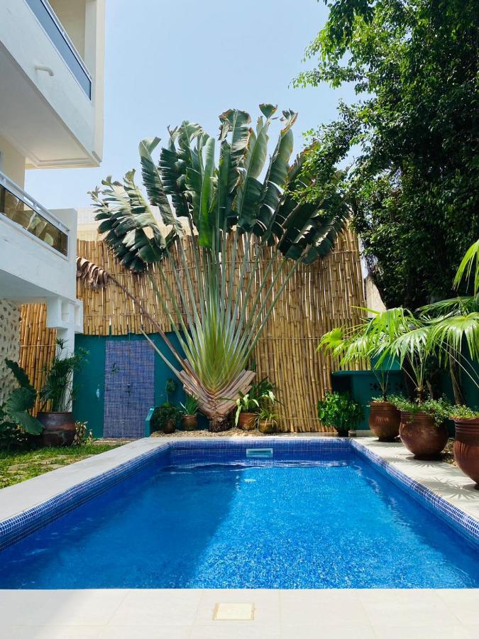 L'Oasis Guesthouse Cotonou Exterior photo