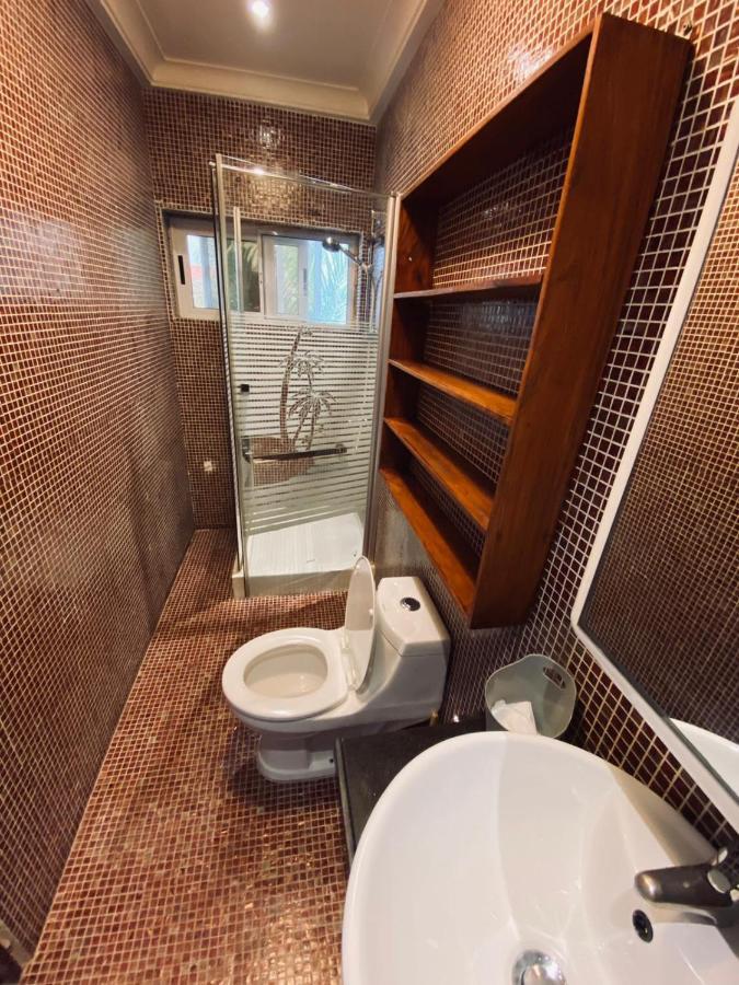 L'Oasis Guesthouse Cotonou Exterior photo
