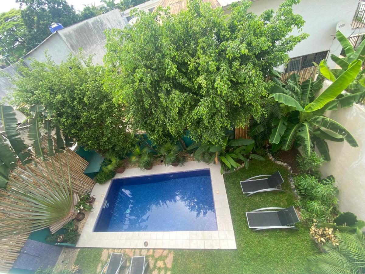 L'Oasis Guesthouse Cotonou Exterior photo