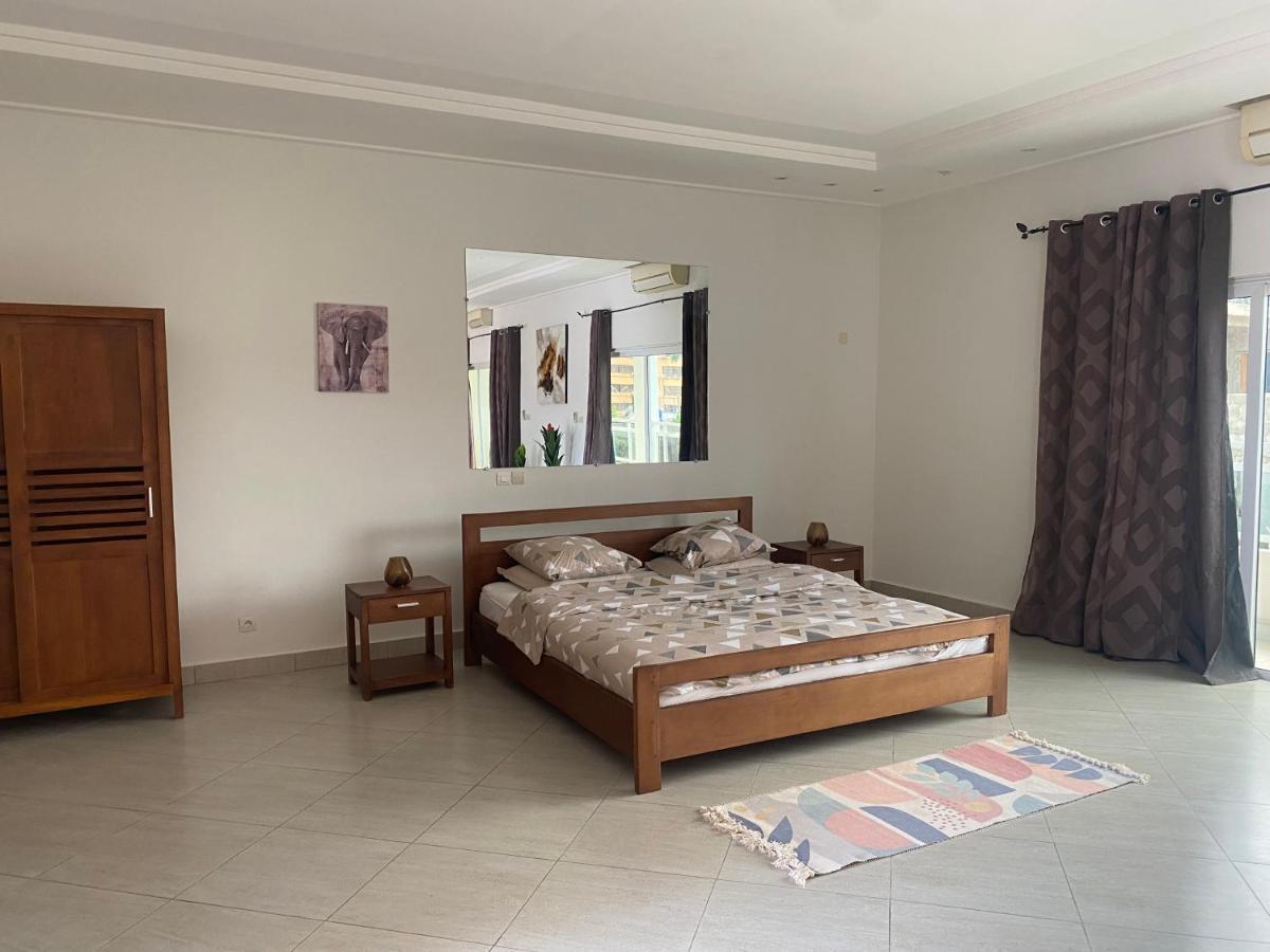 L'Oasis Guesthouse Cotonou Exterior photo