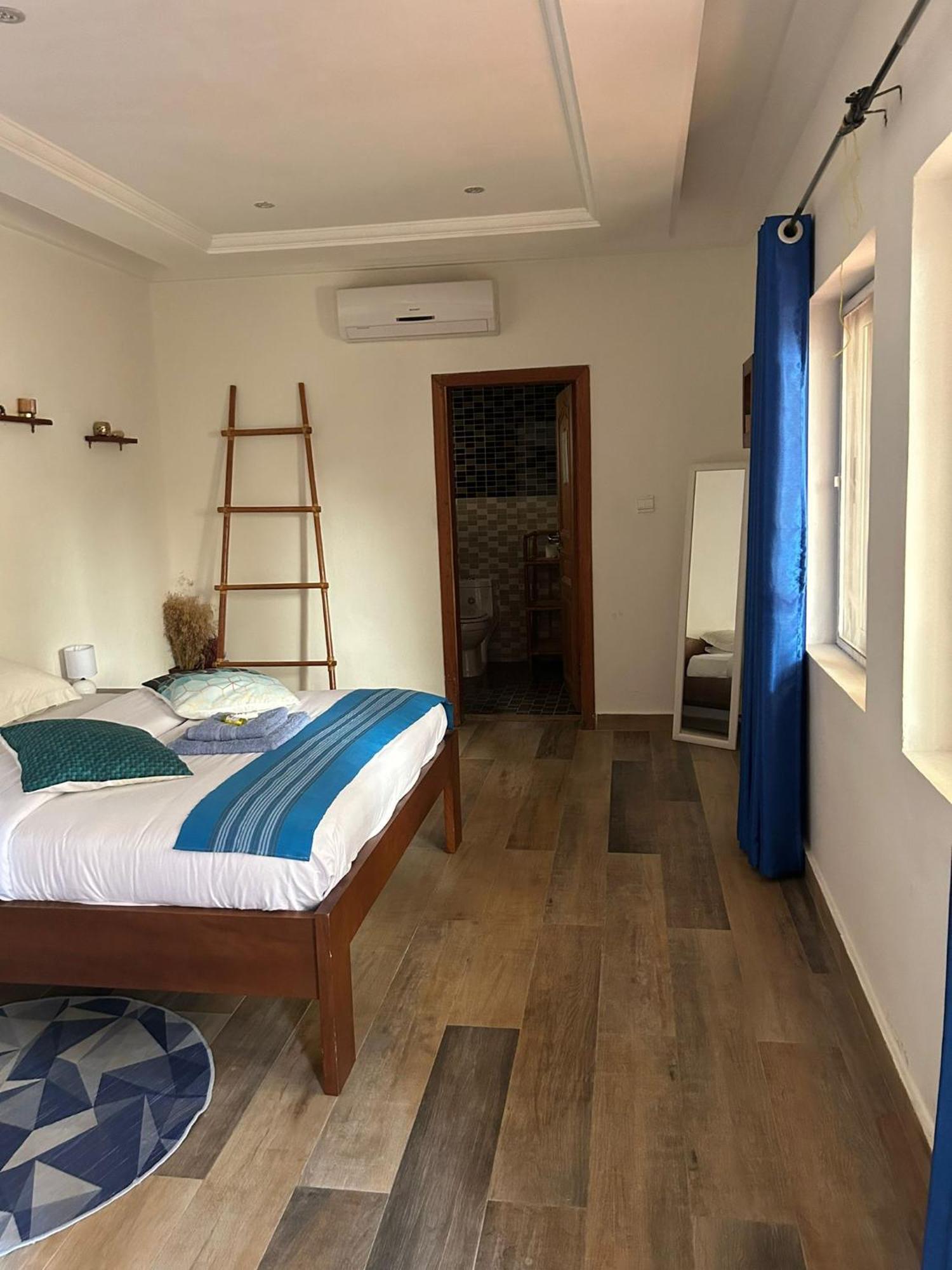 L'Oasis Guesthouse Cotonou Exterior photo