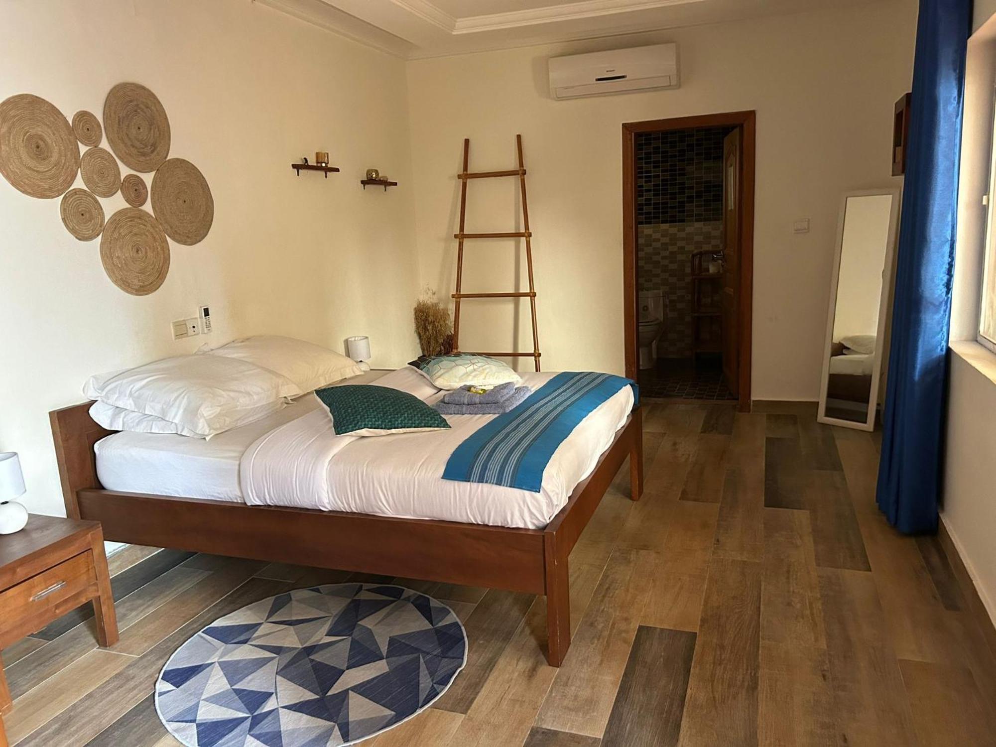 L'Oasis Guesthouse Cotonou Exterior photo