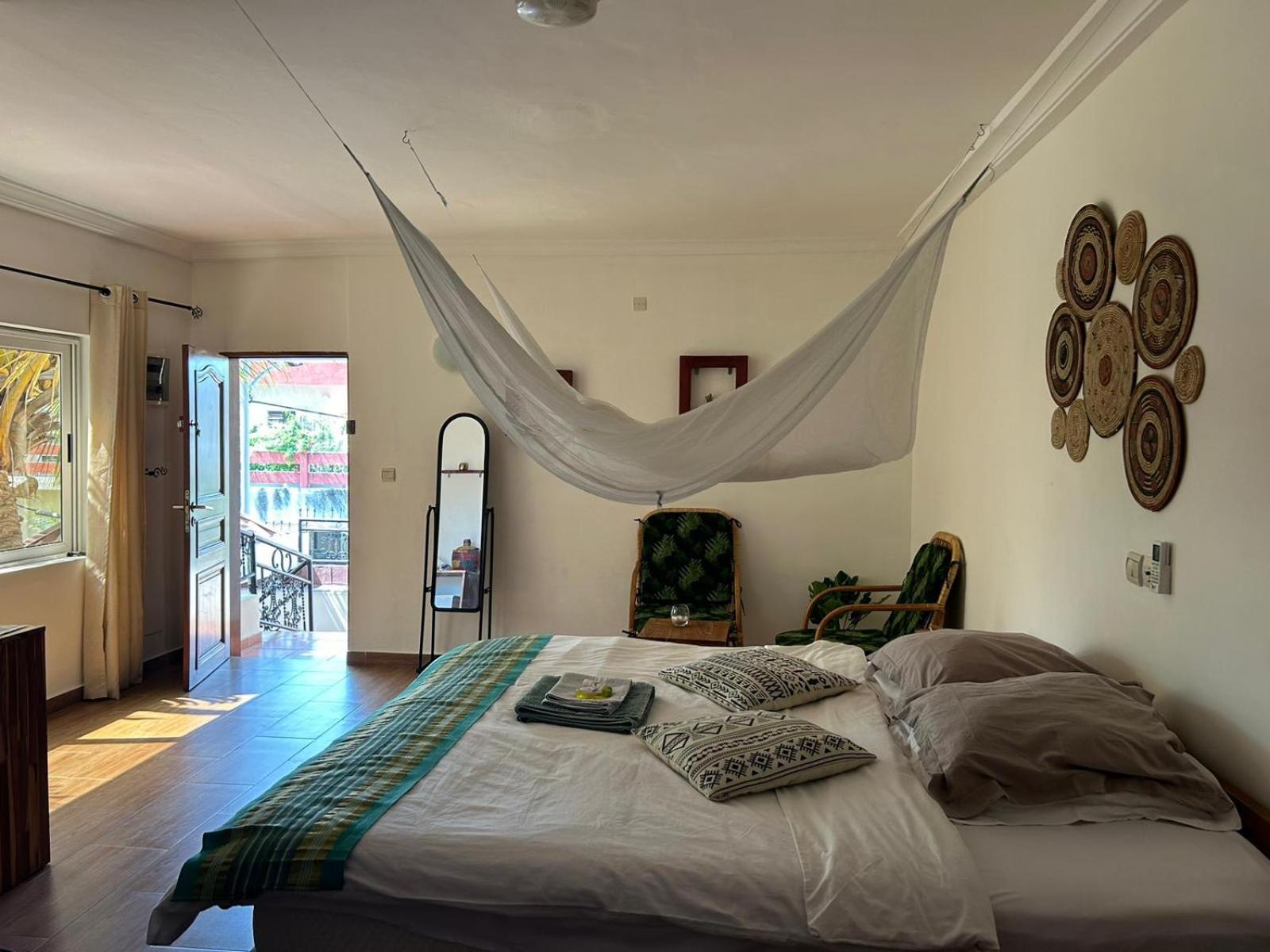 L'Oasis Guesthouse Cotonou Exterior photo