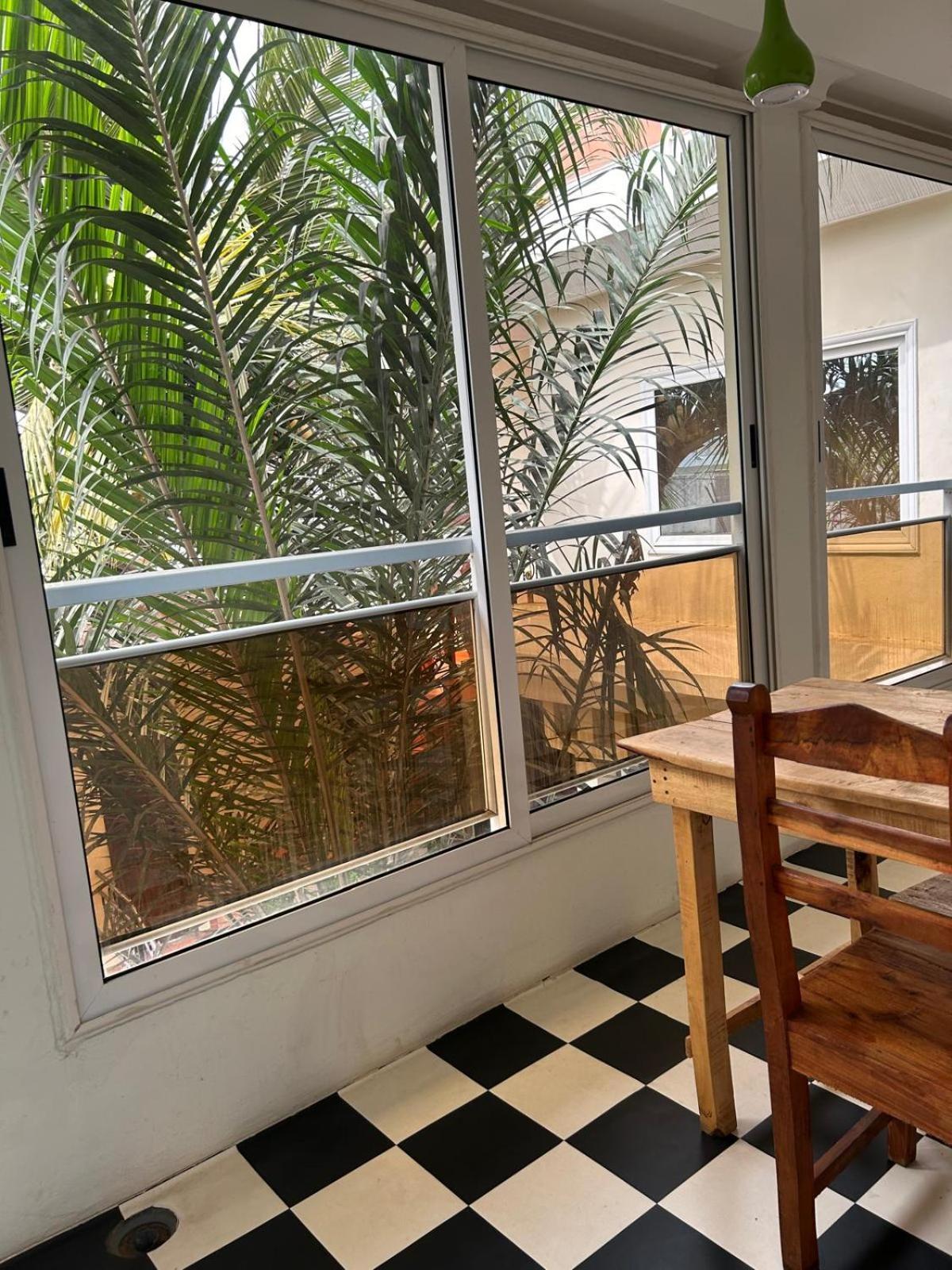 L'Oasis Guesthouse Cotonou Exterior photo