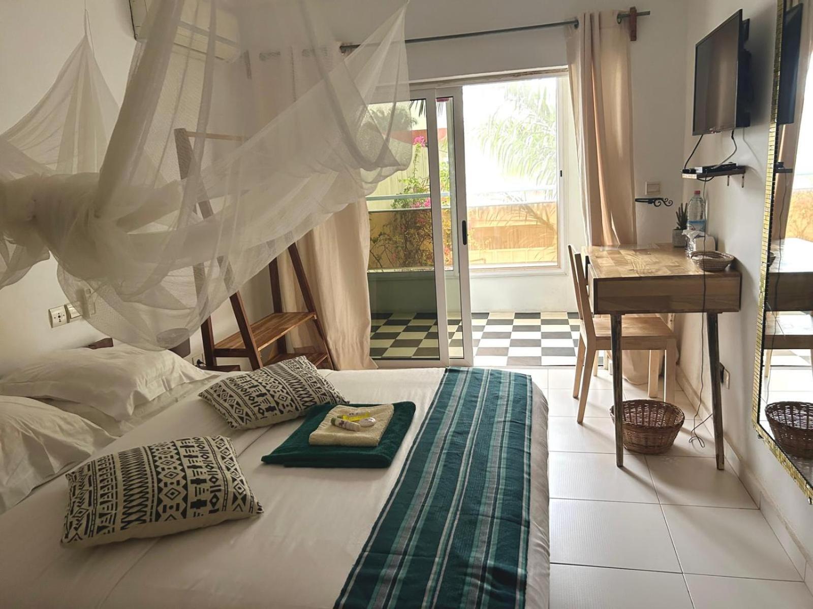 L'Oasis Guesthouse Cotonou Exterior photo