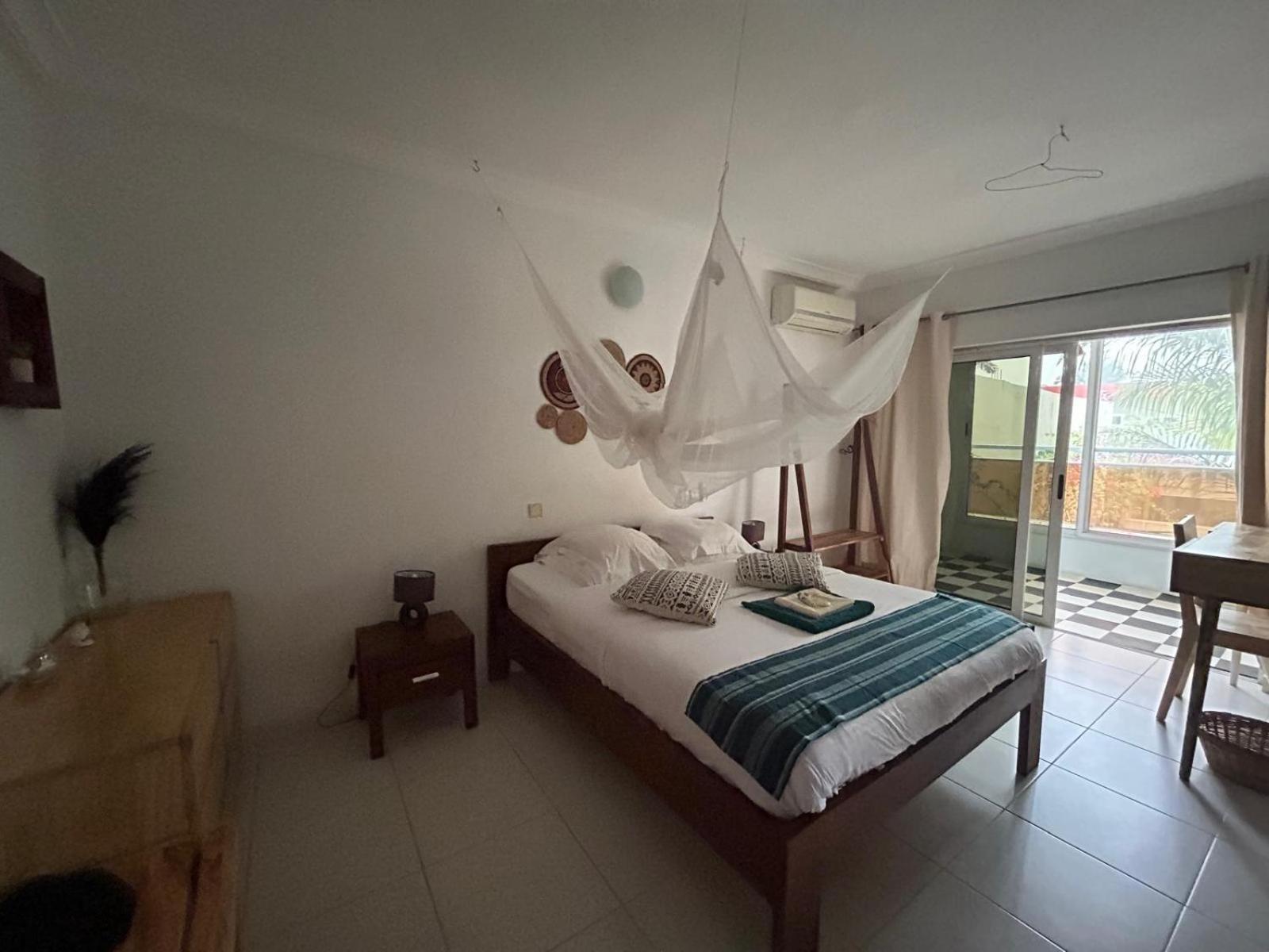 L'Oasis Guesthouse Cotonou Exterior photo
