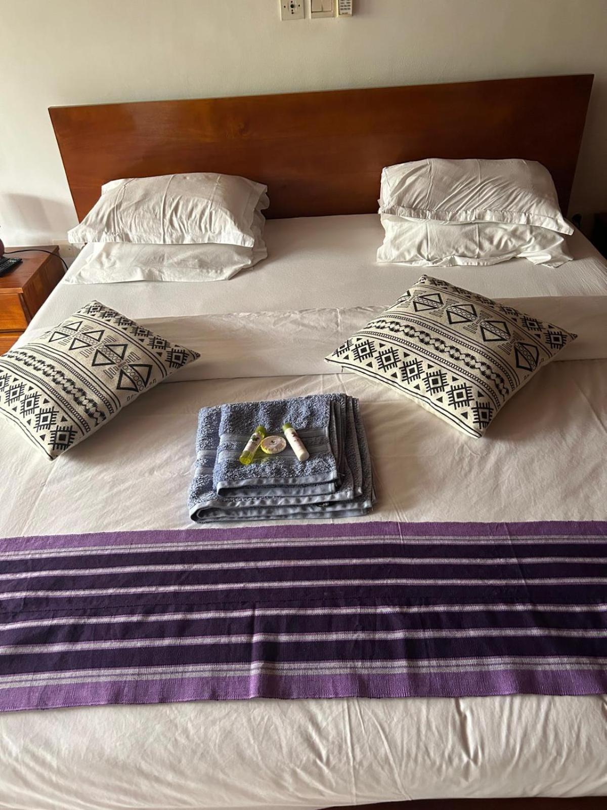 L'Oasis Guesthouse Cotonou Exterior photo