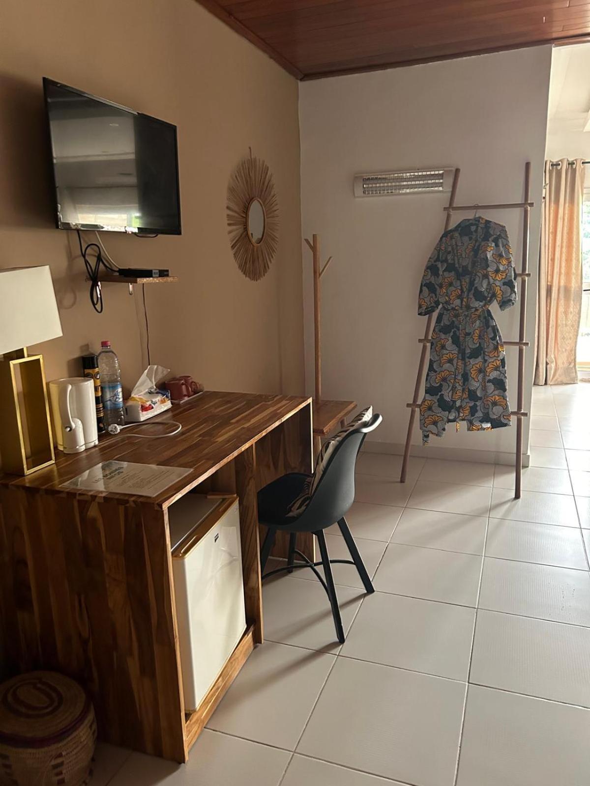 L'Oasis Guesthouse Cotonou Exterior photo