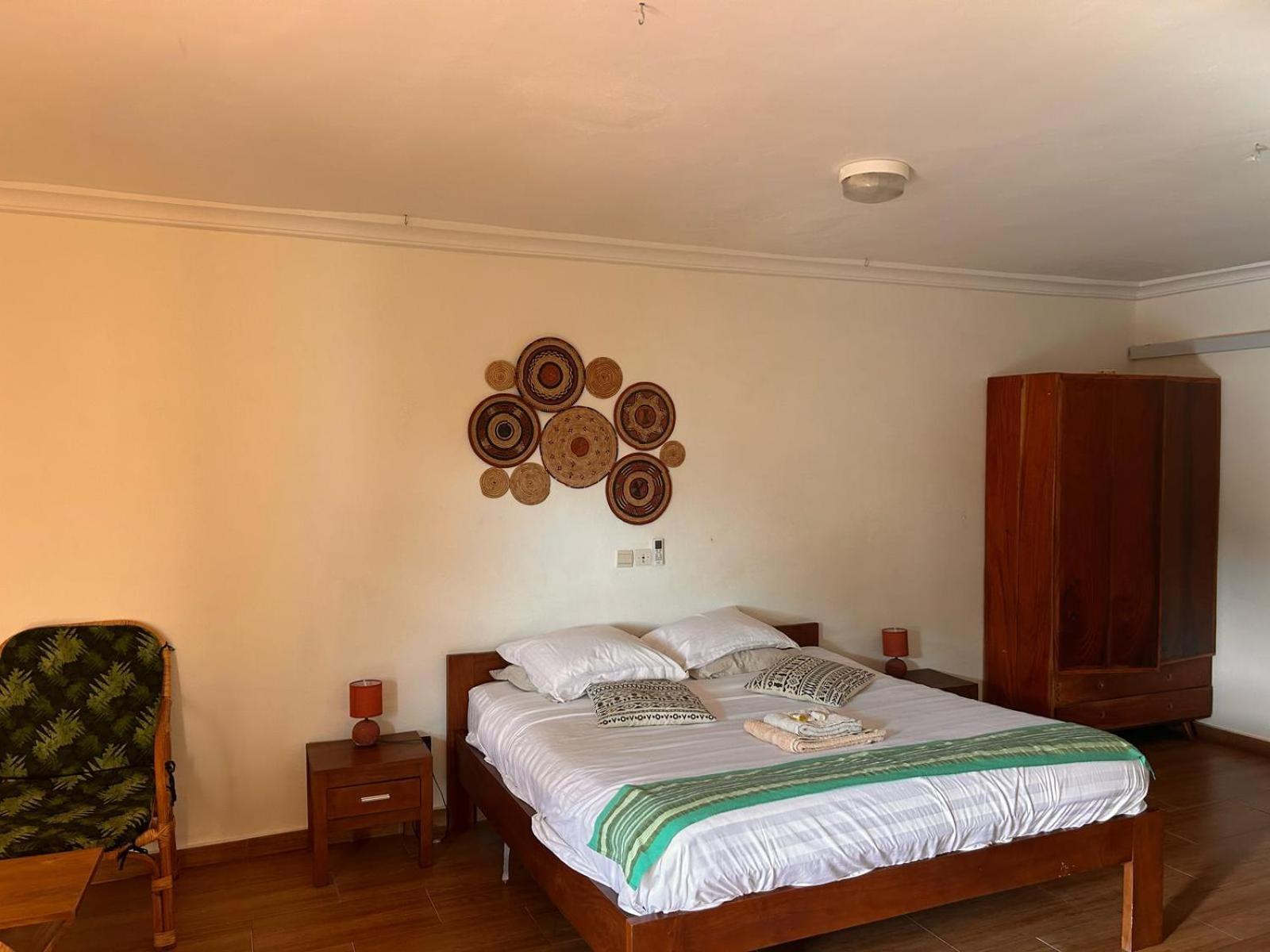 L'Oasis Guesthouse Cotonou Exterior photo